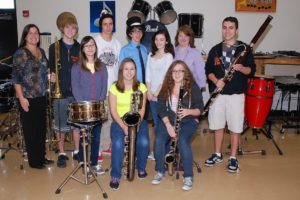 WHS band and choir students accepted into the annual National Association for Music Educator's All-Northwest/All-State honor groups include, back row, from left: WHS band teacher Kelly Ritter, Riley Miller, Austin Smith-Brown, Bret Wade, Zoe West, WHS vocal music teacher Jen Mahorney and Nick Stevens. Front row: Crystal Saltmarsh, Sydney Niemi and Allix Fisher.