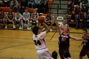 Aaron Deister (left) and the Washougal Panthers are ready to take on all comers on the basketball court. The boys have already played W.F. West, Tenino, Battle Ground and Hudson's Bay.