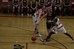 Megan Sharp cuts through two Trappers Thursday, at Fort Vancouver High School. The Washougal girls won 56-55.