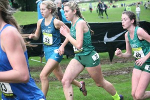 Camas runners Alissa Pudlitzke (78) and Emma Jenkins (80) charge up the hill during the Nike Cross Nationals Saturday, on the Glendoveer Golf Course, in Portland, Ore.