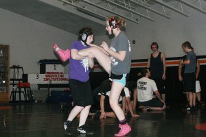 Sisters Samantha and Jessica Eakins spend more time on a wrestling mat than they do in their own home. "It's all we have ever known," Jessica said.