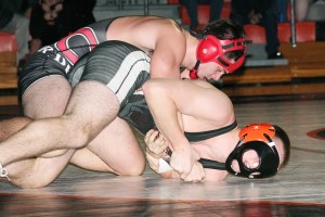 Talon Edmiston blinds this Battle Ground Tiger on the wrestling mat Wednesday. "I'm looking forward to getting right back to work," the Camas High School senior said after his 18-2 victory. "Embrace the grind."