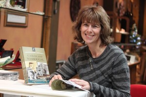 Rene' Carroll, of Washougal, signed copies of her book "Legendary Locals of Camas and Washougal" on Friday night at Runyan's Jewelers in downtown Camas. The book, which profiles the individuals and groups, past and present, who have had a lasting impact on the community, was officially released yesterday by Arcadia Publishing. Carroll will hold three more book signing events before Christmas. "This is the fun part," she said, "sharing it with people."