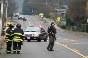 Police closed a four-block area in Washougal Wednesday morning as they responded to reports of shots fired and a house on fire. All businesses and residences within a four-block area between 32nd and 34th Streets, and between Evergreen Way and Webster Lane were evacuated. Four schools were also on lock down.