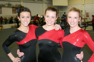 Camas High School gymnasts Hali Ramirez, Hayden Sutton and Audrey Siebenthaler (left to right) are building a lifelong friendship through athletics.