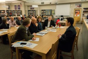 Cameron Vega, Camas High School DECA chapter president,  presents his public relations campaign to business and community members including Bracy Ratcliff, Crawford Tuttle, Mark Klein and Dana Coates.