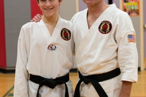 Following in the footsteps of his son Brandon, Robert Harvey earned his black belt on Dec. 2 from the Riverside Martial Arts academy in Washougal.