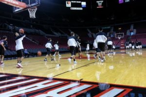 The Camas High School boys basketball team warms up before playing game on the same court at the Portland Trail Blazers Friday, at the Moda Center.