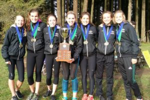 The Camas girls cross country team captured the district championship trophy Thursday, at Lewisville Park in Battle Ground. Pictured left to right: Brooke Roy, Gabrielle Postma, Emma Jenkins, Alissa Pudlitzke, Maddie Woodson, Kaylee Merritt and Emily Wilson.