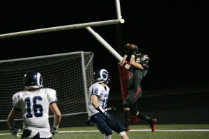 Sean Ramage snags a touchdown pass for the Camas High School football team Friday, at Doc Harris Stadium. The Papermakers defeated Rogers 56-7.