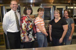 Mark Jasper, Cheryl Bastian, Molly Krabbenhoft, Nancy Sonneson and Trudi Jones were recently honored for their work serving meals to firefighters during the Gold Rush Fire that burned for eight days just 12 miles northeast of Washougal.    