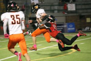 Zack Neketuk breaks free from a Fort Vancouver Trapper Friday, at Kiggins Bowl. He ran for 118 yards and a touchdown. The Washougal Panthers held on to a 28-27 victory.