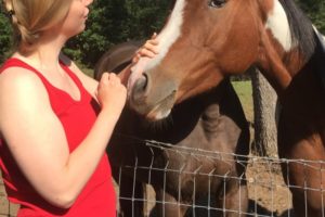 Karin Tetzner, a former German exchange student, had an opportunity to visit horses at Rolling Hills Stables, in Washougal. She helped tend to a leg wound on one of the horses. Tetzner works in an animal clinic in Hammah, near Hamburg.  