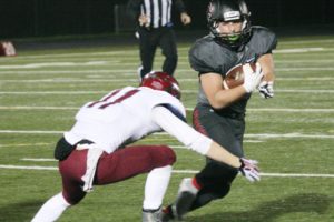 Jordan Del Moral continues his pursuit to four touchdowns for the Camas football team Friday, at Doc Harris Stadium. The Papermakers beat Bethel 49-6 to return to the state tournament.