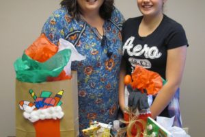 Jenny (left) and Brooke Dayley are seeking donations of candy, travel-sized toiletries, food, games and gift cards to give to students with special needs in Washougal. 