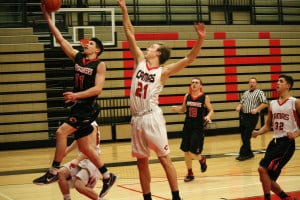 Ethan Unger (11) glides to the hoop for the Papermakers during a scrimmage game Friday, at Camas High School. He believes in a culture built on "enthusiasm, thankfulness and selflessness. Those are the three pillars we have."