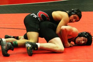 Sophomores Rylan Thompson (top) and Jonathan Taylor (bottom) wrestled into overtime during an intersquad scrimmage Wednesday, at Camas High School.