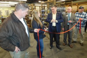 Ribbon cutting participants, to commemorate the opening of Safefire Indoor Shooting Range & Retail Sales, included (left to right) Matt Olson, president of Robertson & Olson Construction, Inc.; Danna Olson, owner of Safefire; Camas Mayor Scott Higgins; Camas-Washougal Chamber of Commerce Executive Director Brent Erickson, and Chad LeDoux, with Robertson & Olson. ìI have grown up in a family that is both passionate about firearms safety and business,î Danna Olson said. ìI have many great mentors in both industries that have helped mold the experience I have today.î 