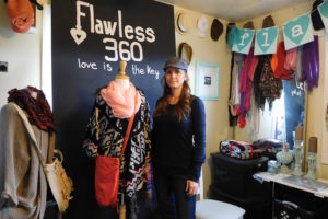 Jennifer Samodurov founded Flawless360 in her Washougal home this past summer after being inspired by the book, "Interrupted," Jen Hatmaker. Her mission is to help teen girls who cannot afford to buy new clothes, and work with them to select the best styles. She does it all online, and then delivers the clothing packets to area schools to be distributed. (Photos by Danielle Frost/Post-Record)