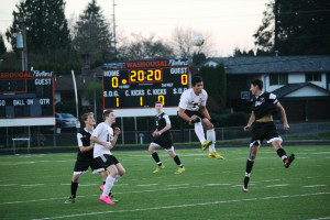 Deivid Gonzalez rises up to the soccer ball for Washougal Friday, at Fishback Stadium. The R.A. Long Lumberjacks defeated the Panthers 3-1.