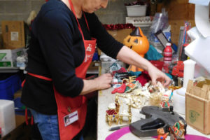 Kathy Little, of Camas, sorts through donated Christmas decorations at ReTails Thrift Store, in Vancouver. Little has volunteered at the store for about a year-and-a-half. Proceeds from the sale of the holiday items, as well as clothing, books, electronics and sporting goods, benefit the Humane Society for Southwest Washington. "I knew I wanted to do volunteer work once I retired, and I have a strong connection with dogs and cats -- especially homeless ones," Little said.