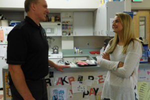 Steve Marshall, CHS principal, chats with junior Halle Sessions in the Papermaker Preschool classroom. Marshall was recently named Greater St. Helens 3A/4A League Principal of the Year.