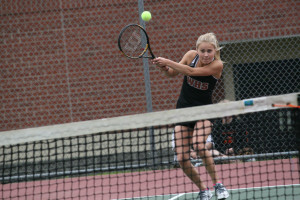 Kassidy Baldwin keeps a volley alive for the Panthers Thursday, in Washougal. Baldwin and Rylee Erdwins won five games in a row to defeat their opponents. 