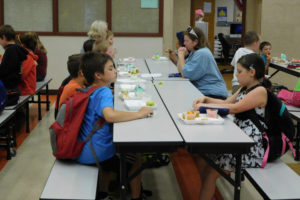 Parents and children enjoy lunch at the Washougal School District's summer lunch program. Due to donations from local churches, parents can eat lunch with their children. The kids' lunches are funded through a government grant. Breakfast and Lunch is served Tuesday through Friday, at Jemtegaard Middle School. 