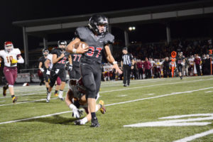 Will Schultz takes off for a 37-yard touchdown run for Camas Friday, at Doc Harris Stadium. The Papermakers defeated Central Catholic 42-10. 