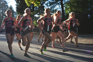 The Camas girls cross country team gets off to a fast start against Union Tuesday, at Round Lake. 