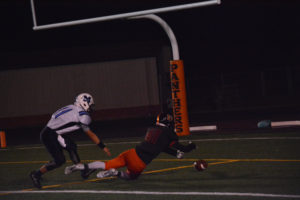 Jake Klackner dives on a fumbled football in the end zone to help Washougal secure a 24-10 victory against Mark Morris Friday. 