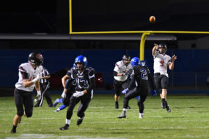 Cooper McNatt gets in position to catch the football from Jack Colletto Friday. The visiting Camas Papermakers defeated Coeur d'Alene, Idaho, 49-30. (Photo courtesy of Kris Cavin)