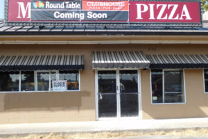 A banner has been installed, announcing the future tenant of 3136 N.E. Third Ave., Camas. Round Table is expected to open in the former Pizza Palace location in mid-November.