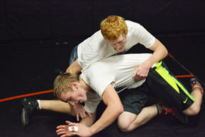 Washougal wrestlers Tanner Lees (on top) and John Gable work on reversals during practice. The Panthers hope to make an impact in the league, county, region and state tournaments. 