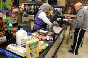 Elena Ephlin, a checker at Safeway in Camas, recently wore purple in honor of Jean Zawistowski, a frequent customer who died at the age of 91, Dec. 21. Purple was Zawistowski's favorite color. 