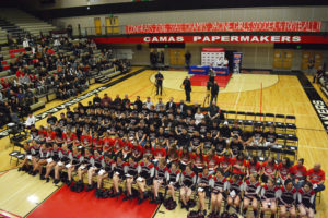 On Jan. 19, Camas High School cheerleaders, runner Yacine Guermali, and members of the Papermaker girls soccer and football teams celebrated a banner fall season that produced three state champions. 