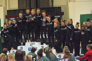 The Camas High School gymnastics team stands on the podium in second place at the 4A state meet Friday, at the Tacoma Dome.