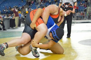 Washougal High School senior Abby Lees goes for the win in the girls 235-pound state championship match at the Tacoma Dome Saturday.