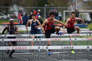 William Sun soars to first place for the Papermakers in the 110- and 300-meter hurdle events Tuesday, at Cardon Field in Camas. 