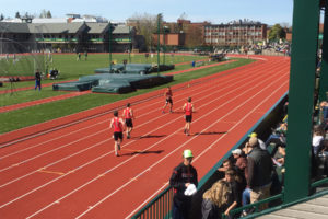 Yacine Guermali, Daniel Maton, Luke Albert and Cade Greseth take a victory lap after winning the 3,200-meter relay for the Papermakers at the Oregon Relays Saturday, at Hayward Field in Eugene. (Photo courtesy of Alisa Wise)