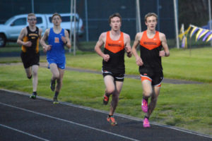 Gabriel Dinnel and Aiden Pullen grabbed the top two places for the Panthers in the 3,200-meter run at the John Ingram Twilight track and field meet Friday, at Columbia River High School. 