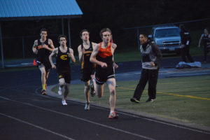 Aiden Pullen takes the lead in the last 100 meters of the 800 run for the Panthers at the Kalama Invitational Friday. The Washougal High School senior also won the 1,600. 