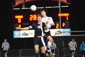 Josh Schneider (9) heads the soccer ball forward for the Papermakers April 19, at Doc Harris Stadium. Skyview defeated Camas 2-1, after scoring the winning goal in the final minute of the game. 