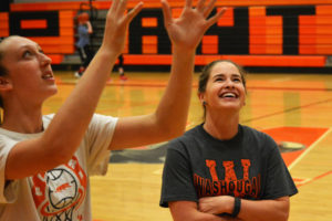 Britney Knotts (right) brings enthusiasum to the gym as the new head girls basketball coach at Washougal High School. 