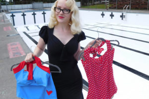 Heather Stepanik shows two of the swimsuit styles sold by her Camas-based company, Red Dolly Swimwear, in front of the Camas Municipal Pool in Crown Park. Stepanik's company also sells retro-inspired dresses.