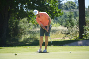 Brian Humphreys fires in a 50-foot eagle putt from the back of the green at the Oregon Golf Club Friday. After six days and 143 holes of golf, the 19-year-old from Washougal earned second place at the Oregon Amatuer Championship.