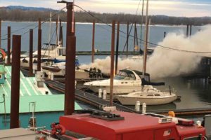 Camas-Washougal Fire crews, along with East County Fire and Rescue firefighters and a Vancouver Fire Department boat, responded to a boat fire Tuesday, Dec. 26, after it was reported at 3:45 p.m. CWFD Battalion Chief Allen Wolk said the boat, located on H-Dock, is a total loss. (Photo contributed by Port of Camas-Washougal)