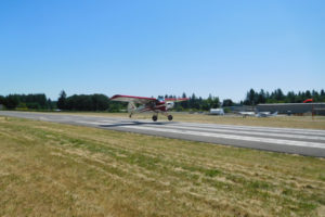 An airplane lands at Grove Field Airport, north of Camas. Port of Camas-Washougal Commissioner John Spencer is leading an effort to have the runway widened and lengthened. (Post-Record file photo)