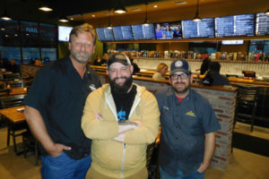 Daren Bowlby, owner of the Growler USA location in Camas (left) credits Assistant General Manager/Brew Guru Joshua "Bear" Trim (center) and General Manager Corey Mathews (right) with helping him run the new pub. Trim and Mathews previously managed a Growler USA franchise in Austin, Texas. 