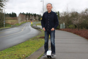 Camas inventor Shane Chen demonstrates his newest invention, the IOTAtrax, a gadget designed to help commuters get from home to public transportation to work more easily. 